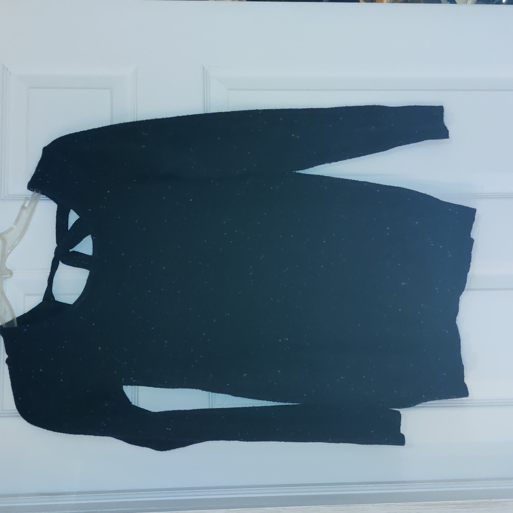 Peek a boo tie back knit sweater. Speckled design